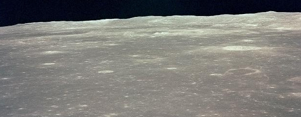 EARTHRISE IN THE MIDST OF A LUNAR DAY.
- A NASA PHOTO FROM THE APOLLO 11 MISSION.